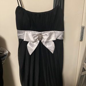 Ladies black Mimi MCQueen dress, with bow. Sized medium